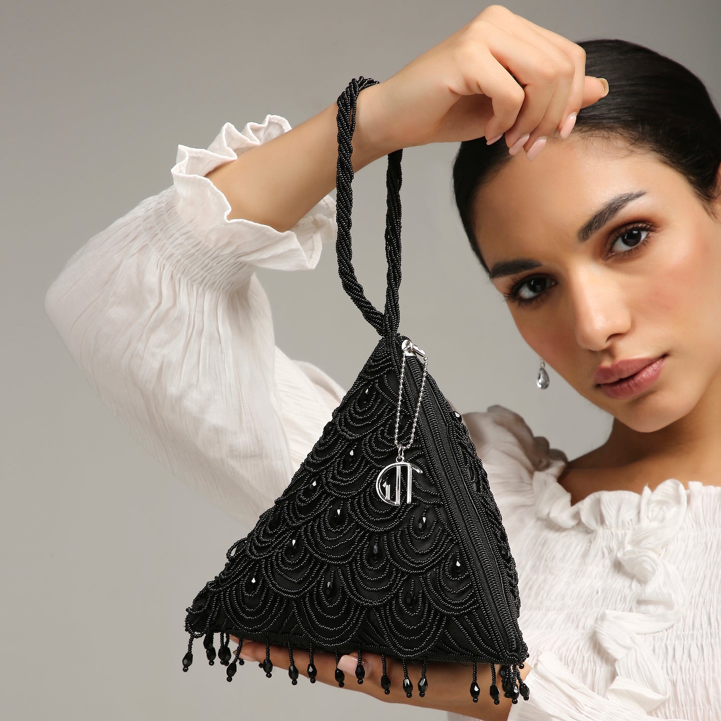 Tiara Black triangle handbag