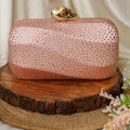 womens pink clutch bag