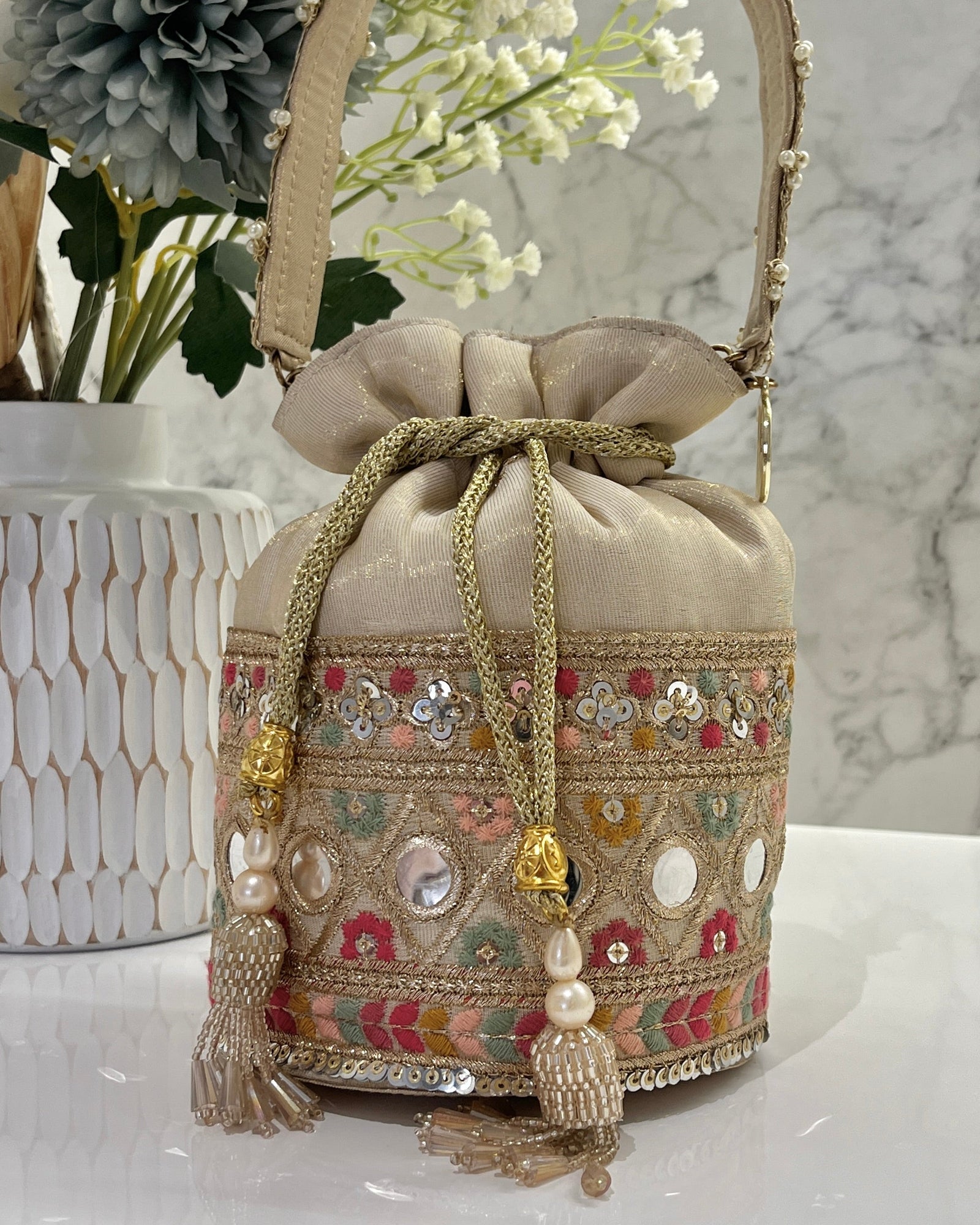 Beige Banarsi Silk Bucket Potli With Pearl Tassel