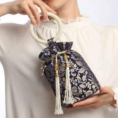 Blue Silk Banarsi Potli With Golden Floral Print