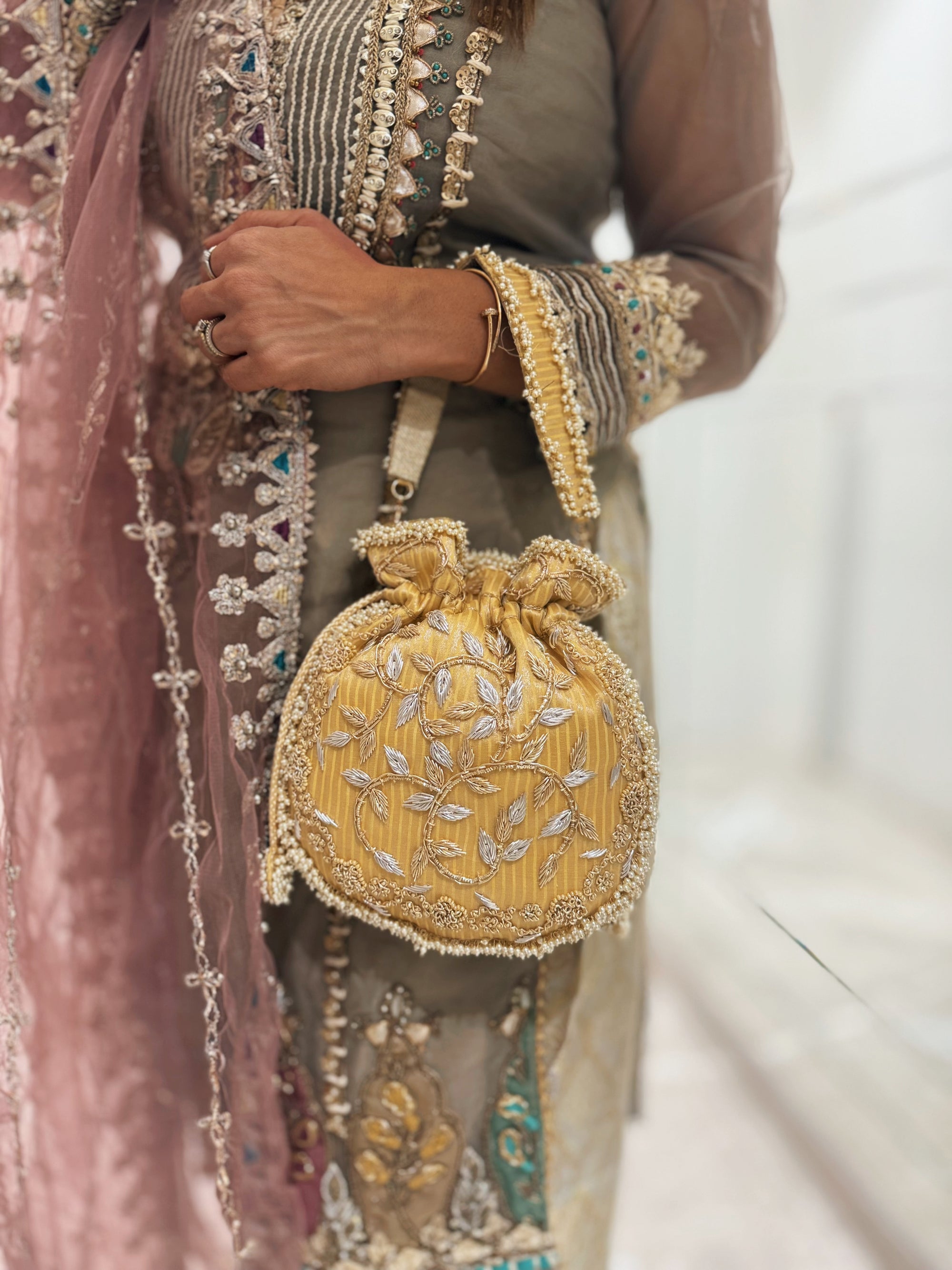 Gold Zardozi Floral Potli