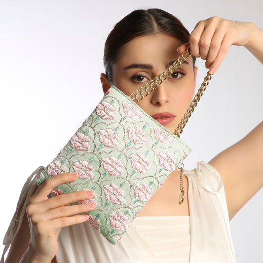 floral clutch with a gold chain strap