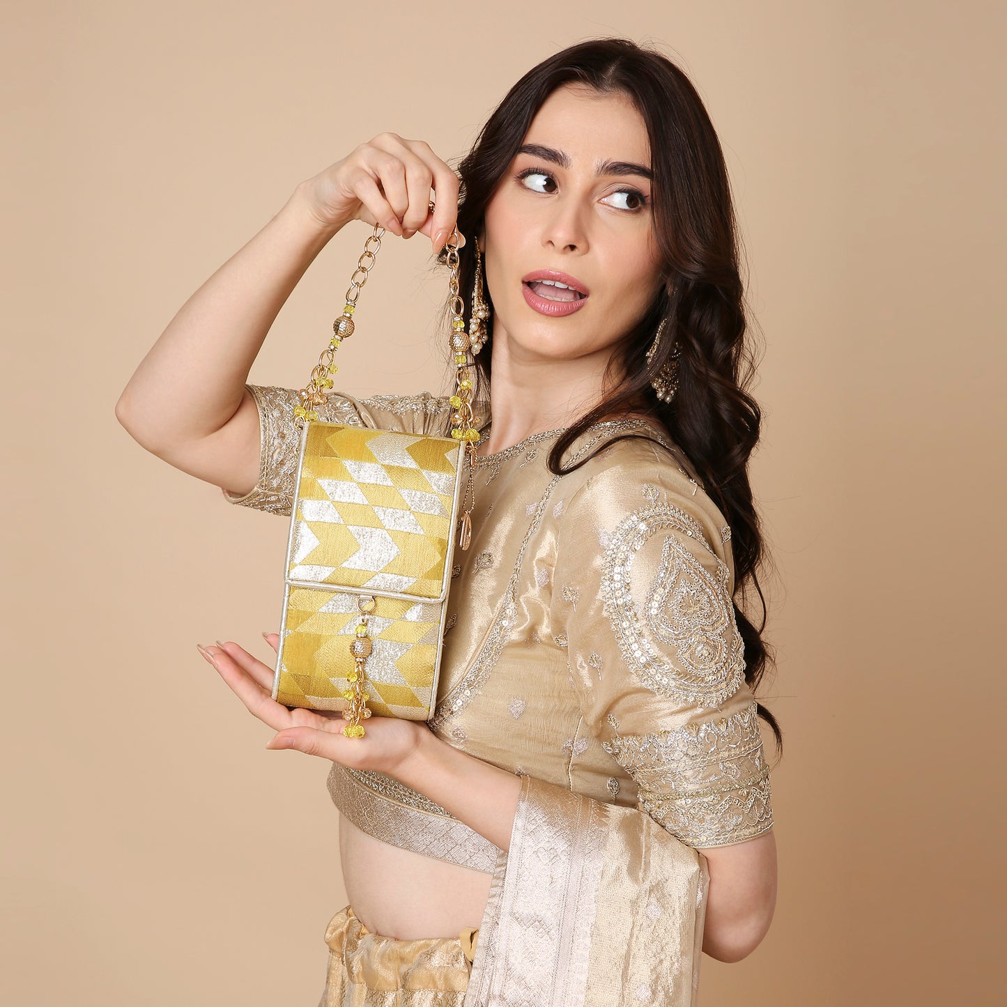 Golden & white Ikhat patterned mobile sling bag