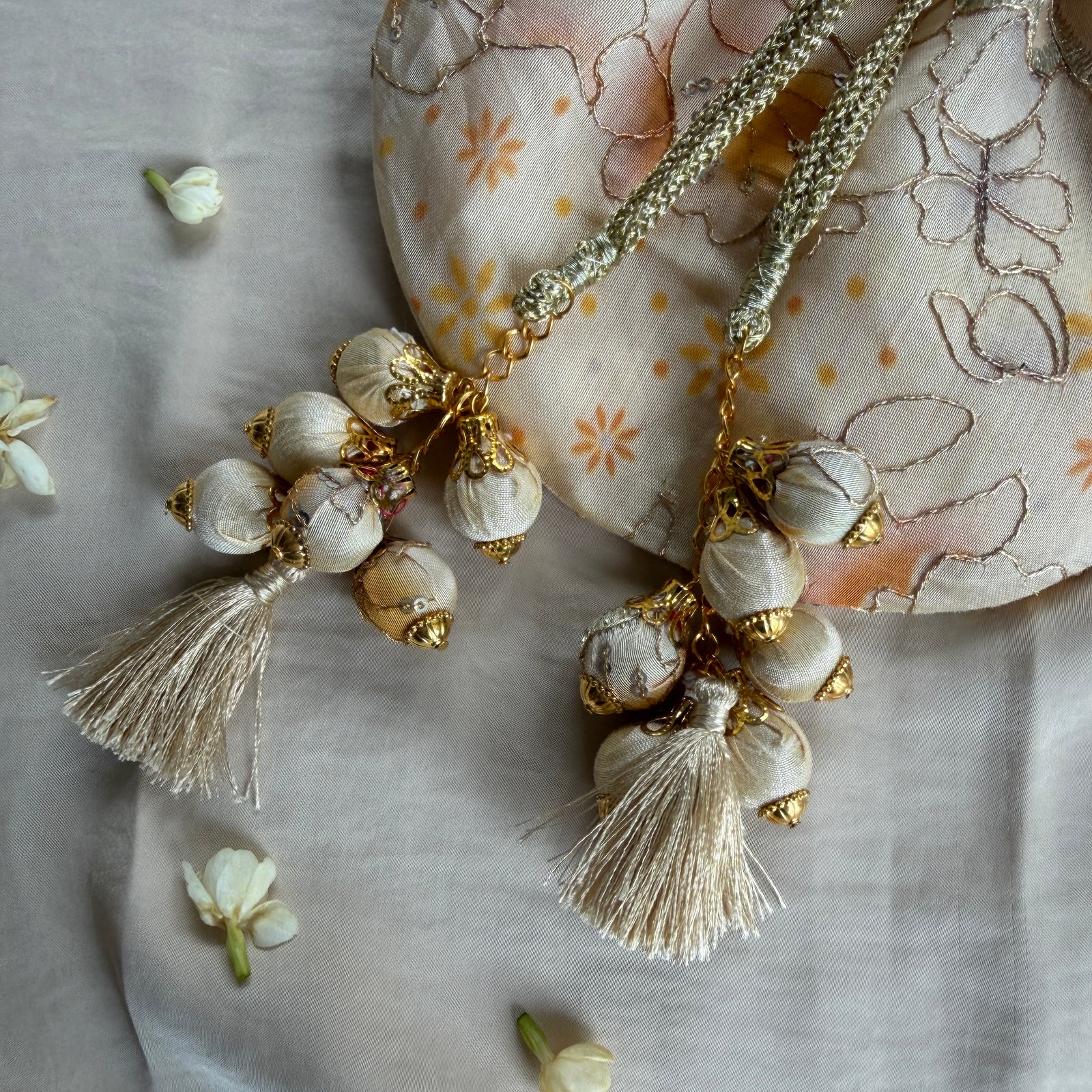 Off-White Floral Mirror Work Strap Potli
