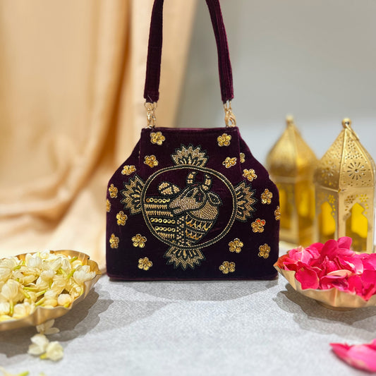 Cow Pichwai Maroon Velvet Handbag