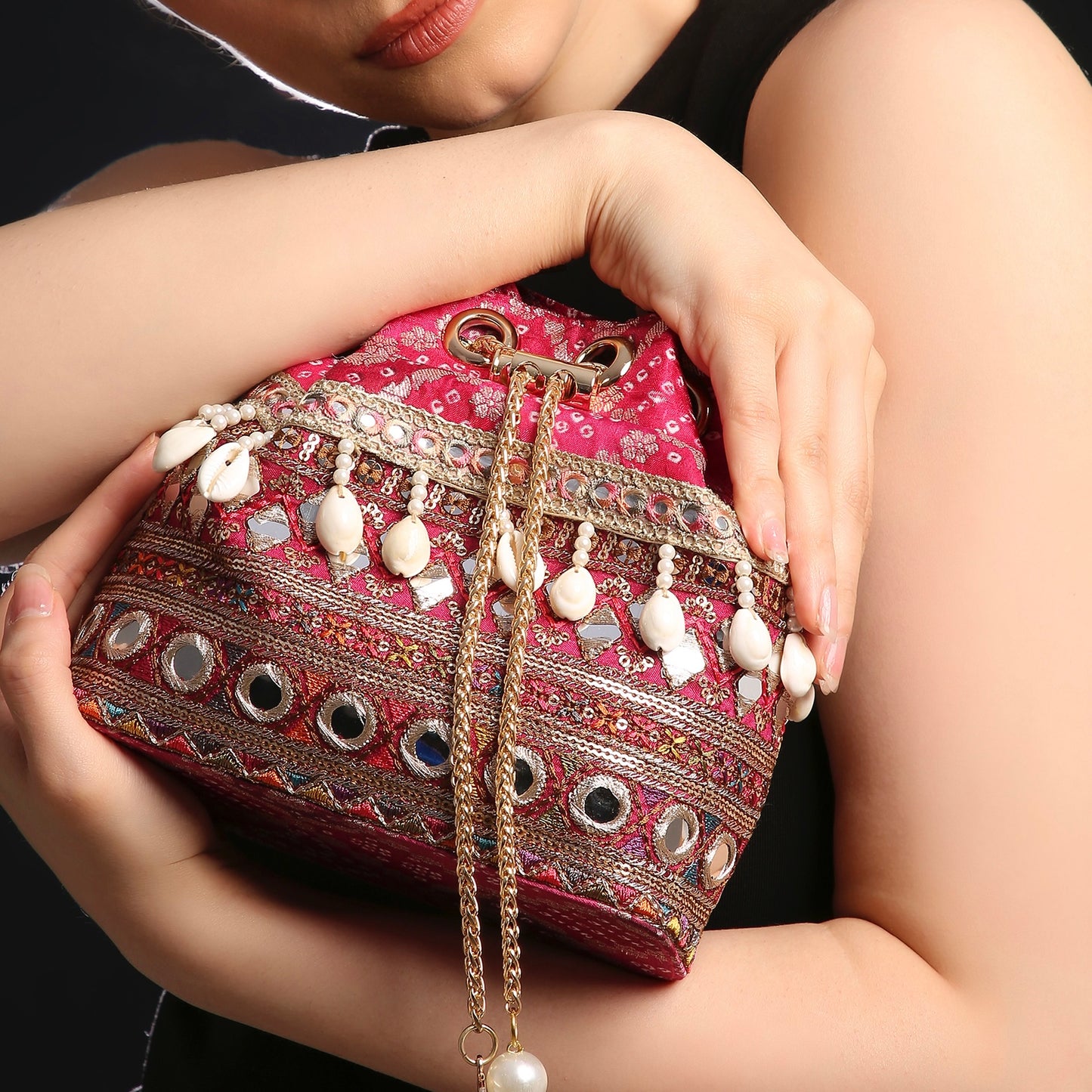 Rani Pink Bandhani Bucket Bag With Mirror Work And Natural Cowrie Shells