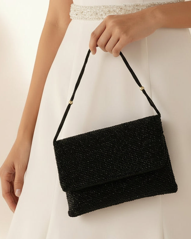 womens black designer clutch bag