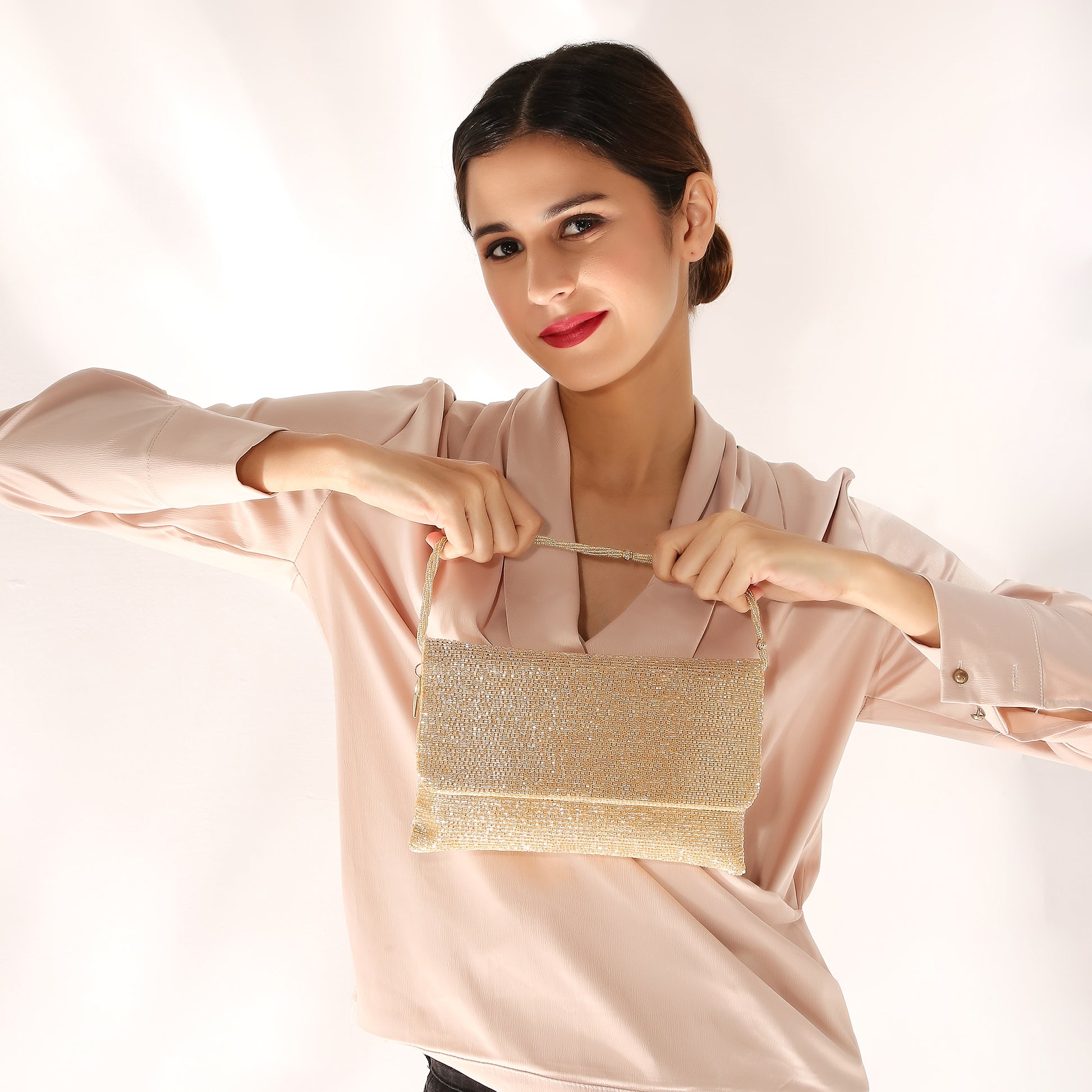 women's orange clutch bag