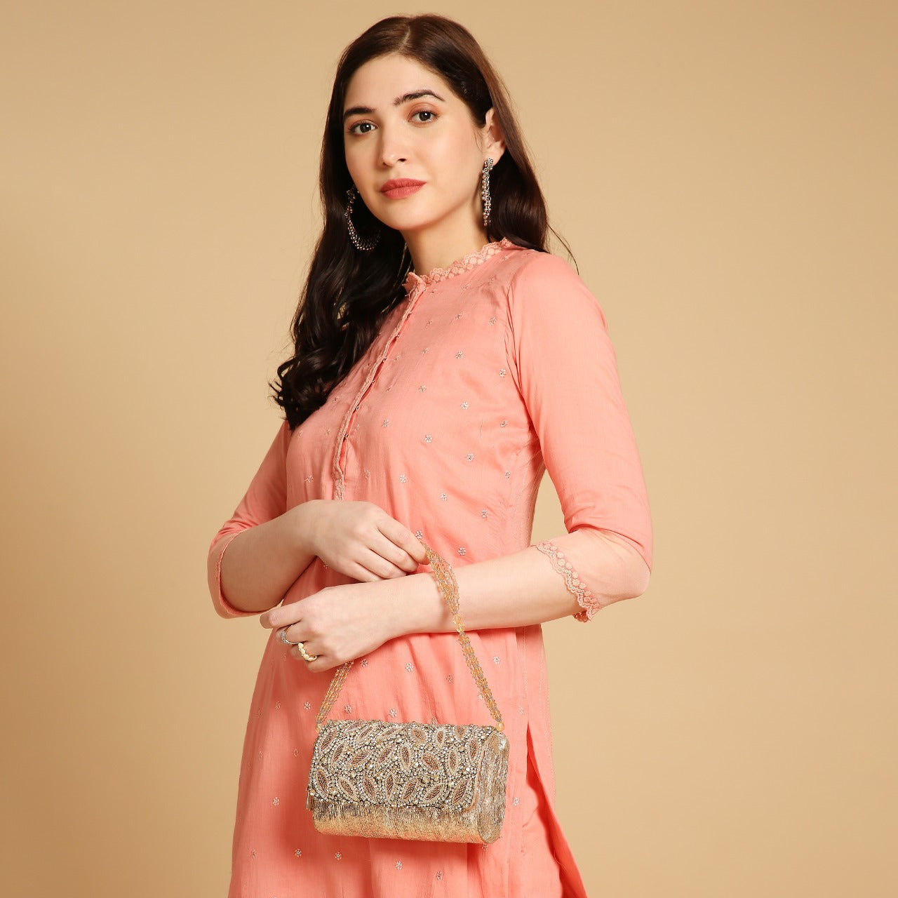 Liesha Rosegold Embellished Clutch bag