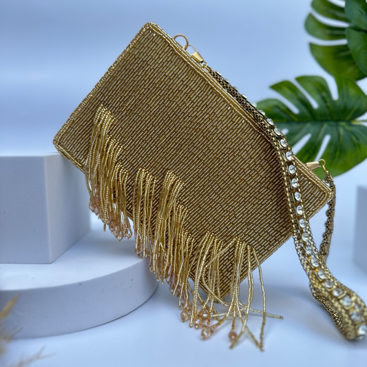 Edie Gold Clutch bag