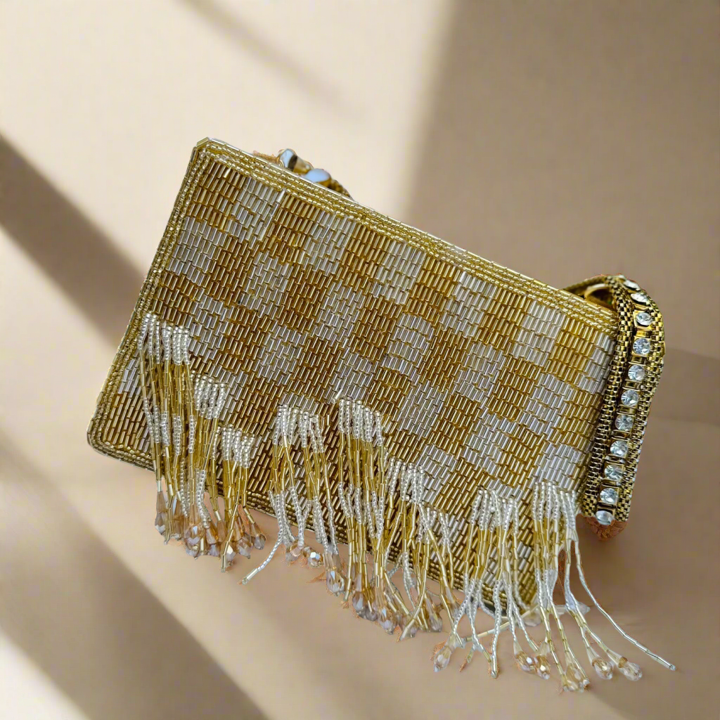 Edie Silver Gold Clutch bag