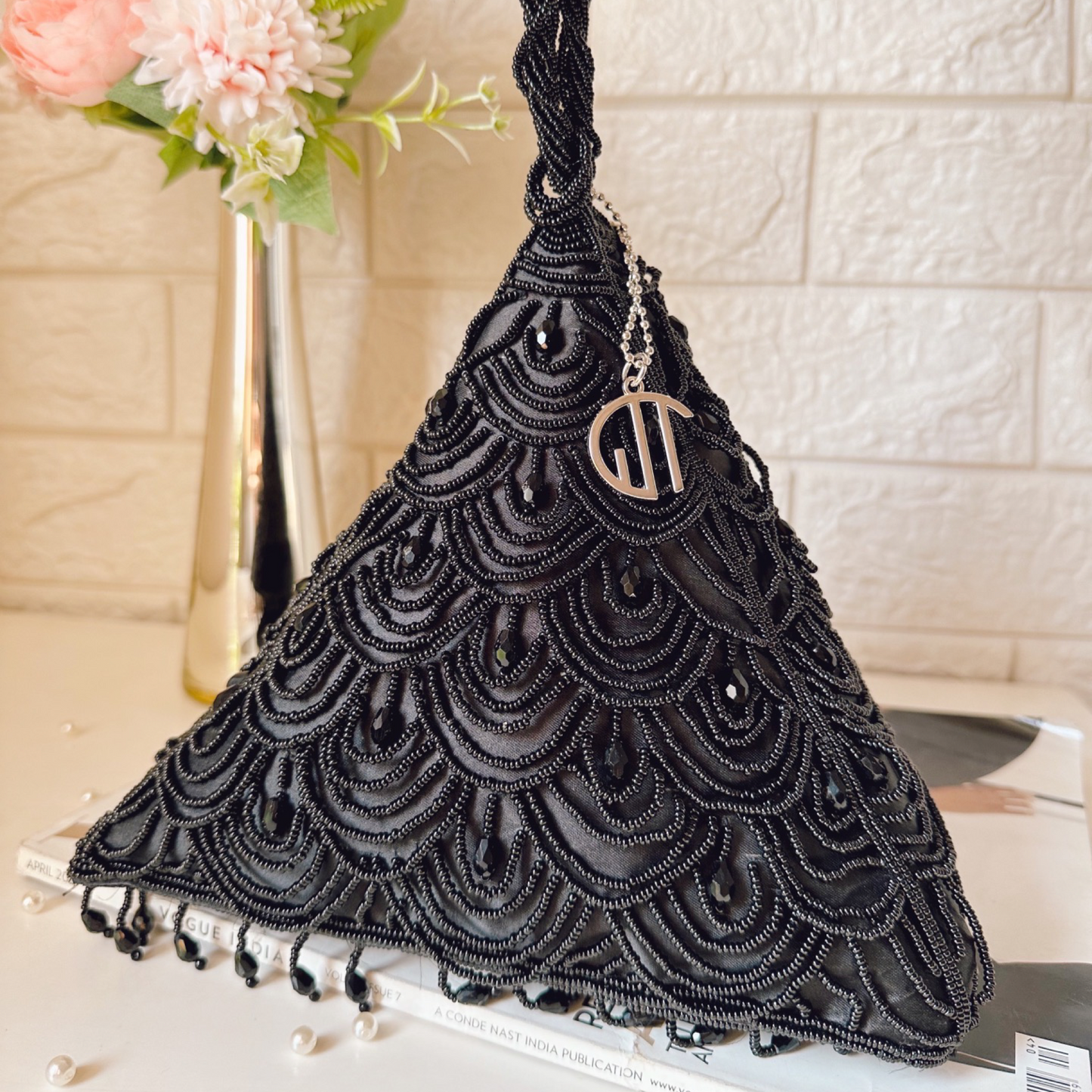 Tiara Black triangle handbag